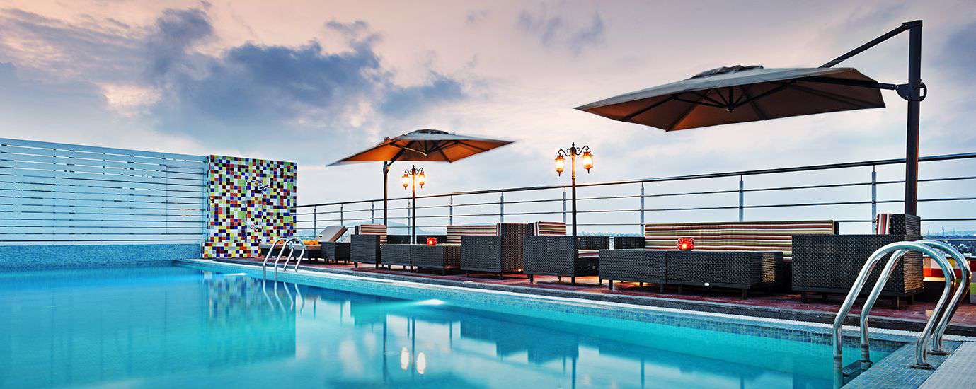 a chic poolside.<br>a riot of colours.